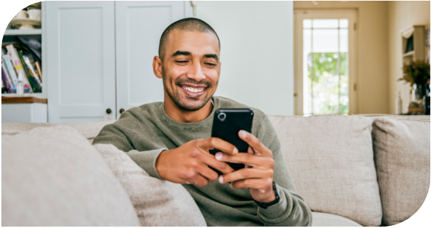 Man on couch with phone
